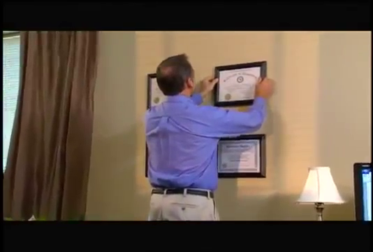 InstaHang TV commercial - Showing off that decorating skill in the office. InstaHang TV commercial - Showing off that decorating skill in the office.