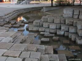 Sidewalk water display.
