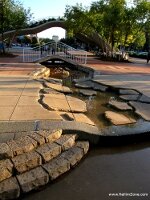 Sidewalk water display.